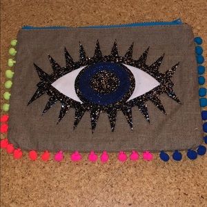 Evil eye satchel (no straps) w/pom poms on sides